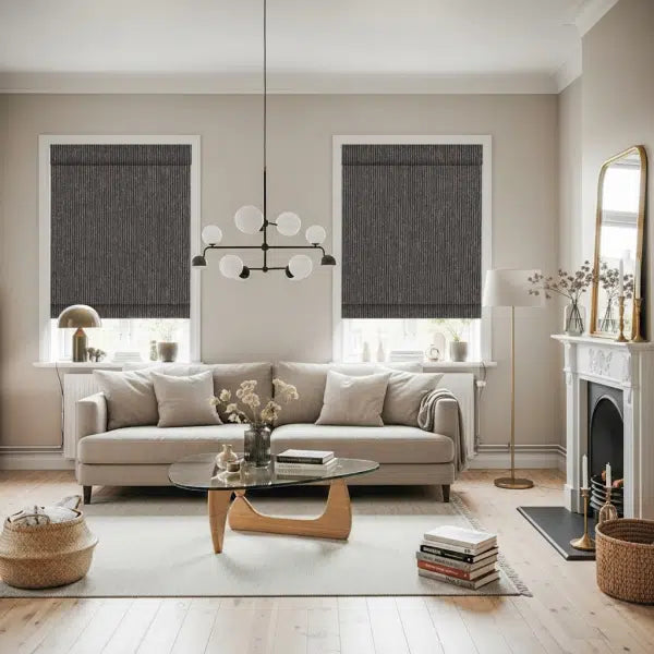 No-drill motorized roller shades in a modern living room with beige sofa, glass coffee table, and natural light.